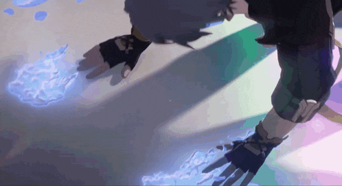a person 's shadow is cast on a white surface with a blue light coming out of it