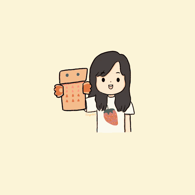 a girl with a strawberry on her shirt holds a cardboard robot