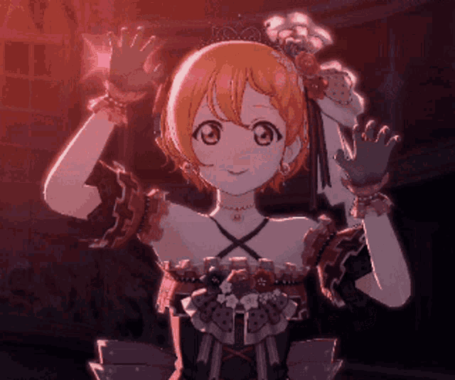a girl with a tiara on her head is waving