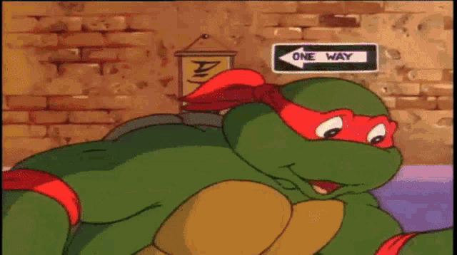a teenage mutant ninja turtle holds up a piece of pizza in front of a one sign