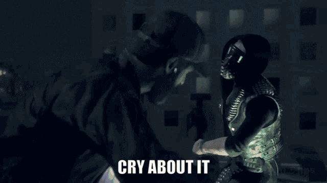 a man and a woman are fighting and the words cry about it are on the bottom