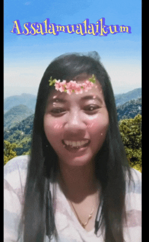 a picture of a woman with flowers on her face and the words assalamualaikum