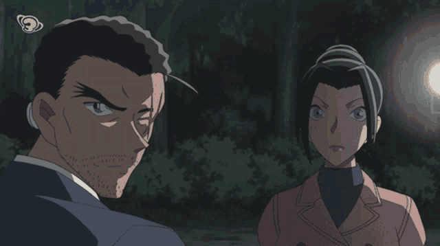 a man and a woman standing next to each other