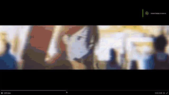 a blurry picture of a woman 's face is being displayed on a screen .