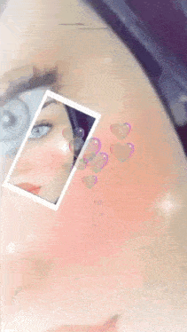a close up of a woman 's face with bubbles and the letter e on the top