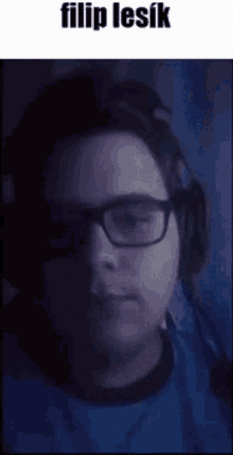 a person wearing glasses and headphones with the name filip lesik on the bottom