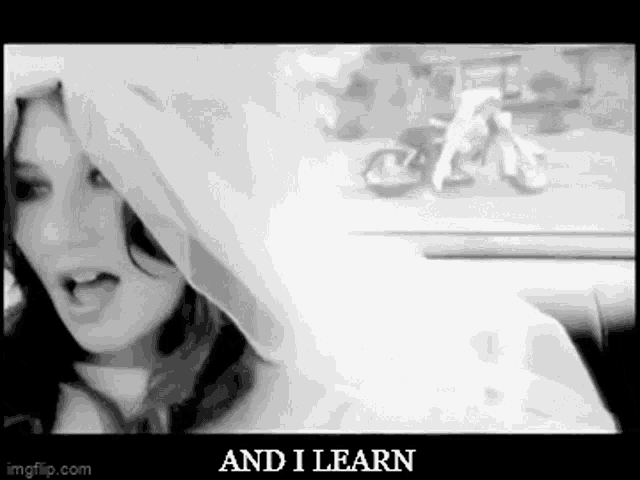 a black and white photo of a woman in a car with the words " and i learn " on the bottom