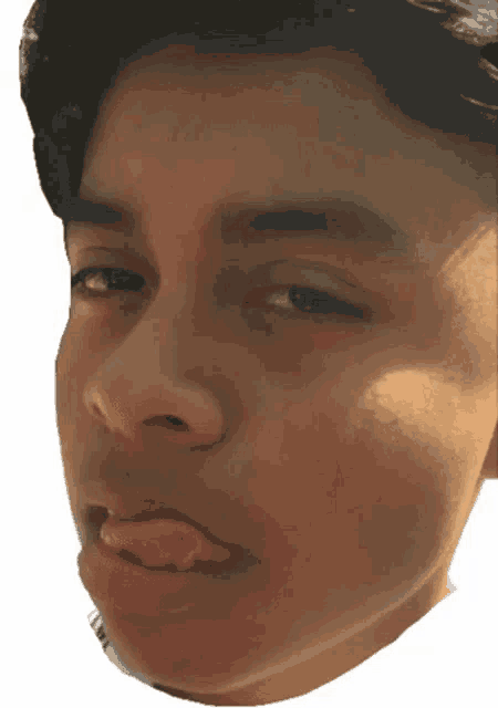 a close up of a person 's face with their tongue out