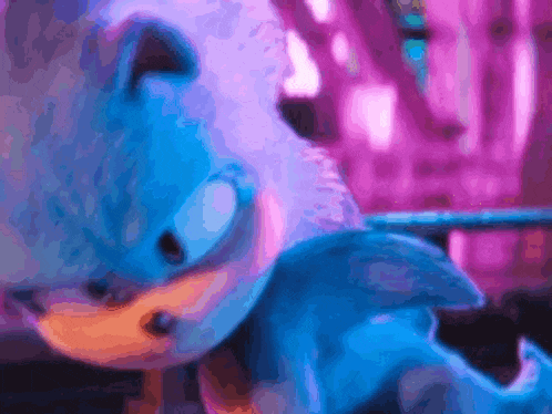 a close up of sonic the hedgehog 's face in a blurry photo