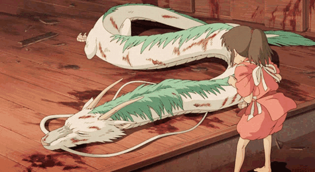 a girl standing next to a large white and green dragon with blood on the floor