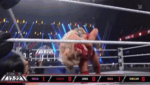 a wrestling match is being shown on a screen that says deadline 7/22
