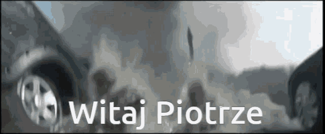 witaj piotrze is written in white letters on a dark background