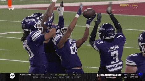 a football game is being played on espn
