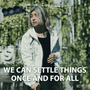 a man in a white jacket with the words " we can settle things once and for all " below him