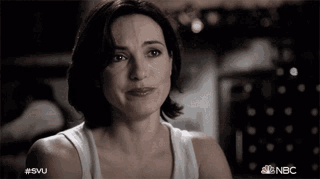 a black and white photo of a woman with #svu on the bottom right