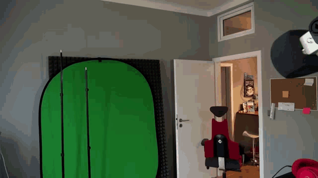 a room with a green screen behind it