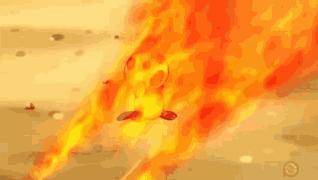 a cartoon character is being thrown into a fire .