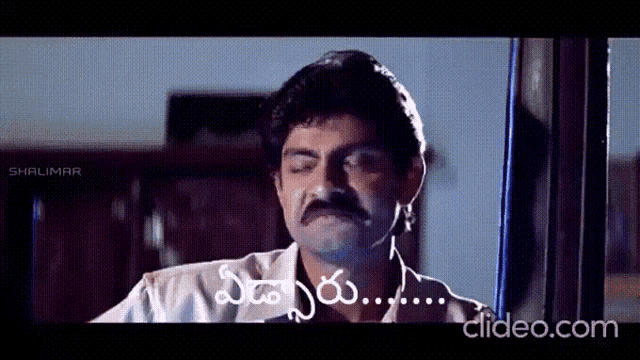 a man with a mustache is saying something in a foreign language ..
