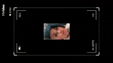 a video of a woman 's face is being recorded in 4k 60fps