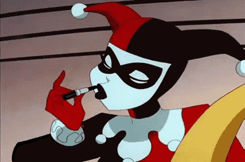 harley quinn from the batman animated series is applying lipstick .