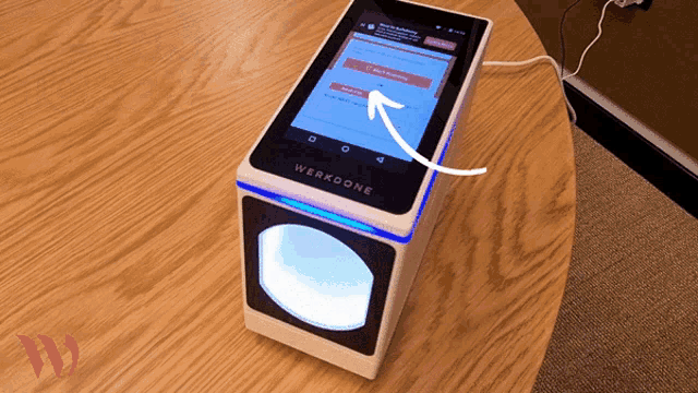 a werkdone device on a wooden table