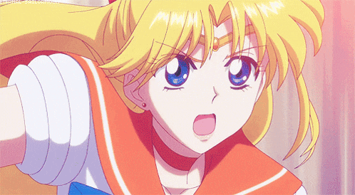 a girl with blonde hair and blue eyes is wearing a red and white sailor uniform