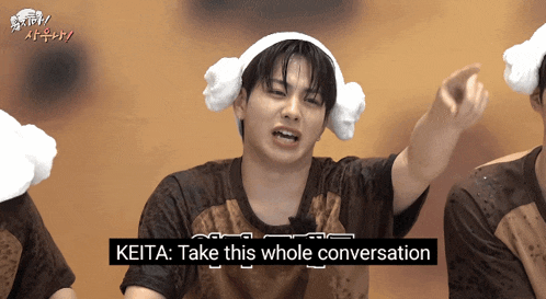 a man wearing a towel around his head says keita take this whole conversation