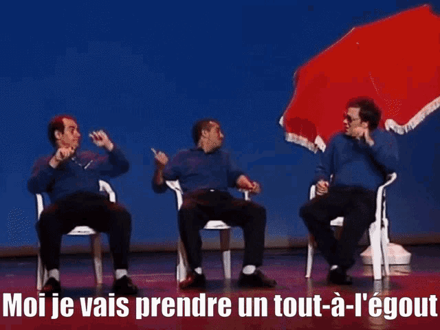 a man wearing sunglasses and a blue shirt says moi je vais prendre un tout-a-l'egout