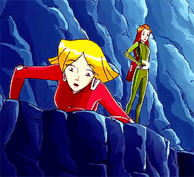 a couple of cartoon characters standing on a rocky cliff