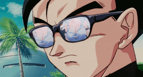 a man wearing sunglasses has a reflection of a woman 's breasts