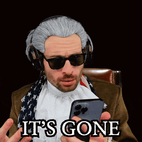 a man wearing a wig and sunglasses is holding a cell phone with the words it 's gone written on it