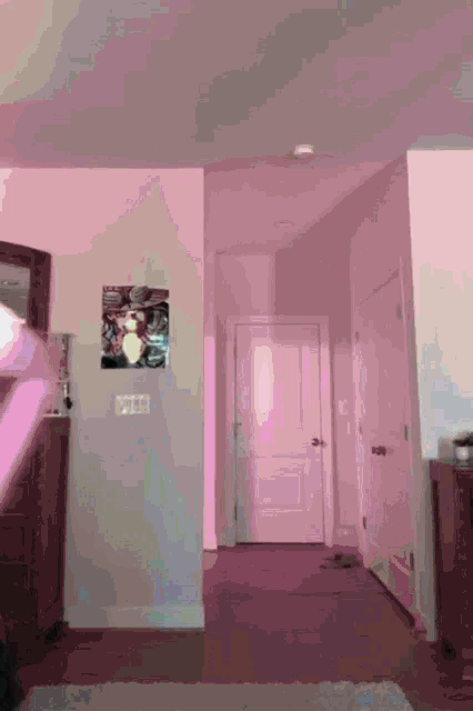a room with pink lights and a picture on the wall that says ' i love you '