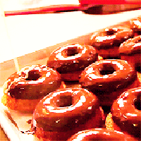 Frosting Some Donuts GIF - Donut Chocolate Glazed GIFs