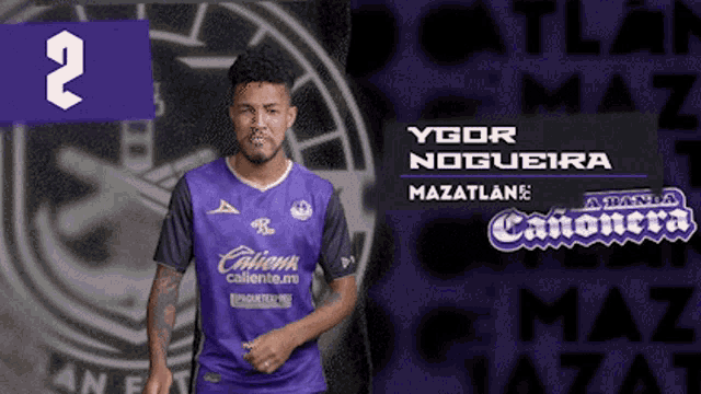a man wearing a purple shirt that says caliente