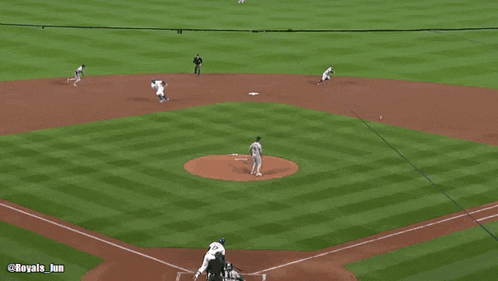 a baseball game is being played on a field that says @royals jun