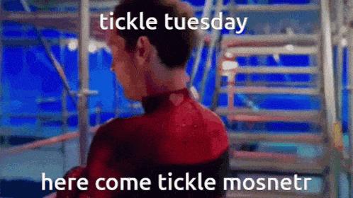 a man in a spiderman suit is standing in front of a set of stairs and says tickle tuesday
