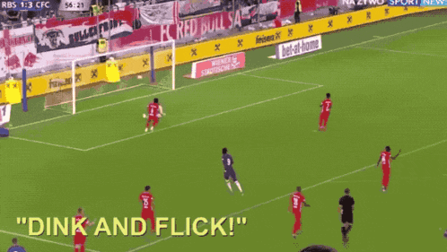 a soccer game is being played and a man says " dink and flick " in front of the players
