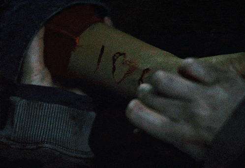 a person has blood coming out of their arm that says ' i love '