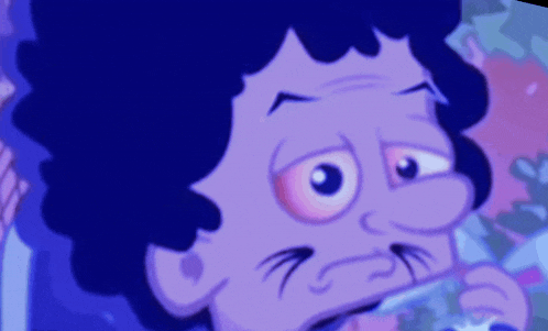 a close up of a cartoon character 's face with big eyes