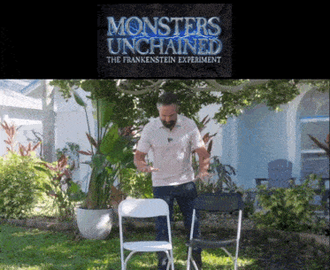a man stands in front of a sign that says monsters unchained the frankenstein experiment