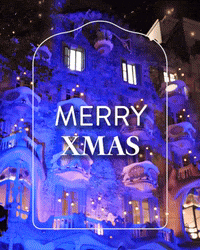 a sign that says merry xmas on a building