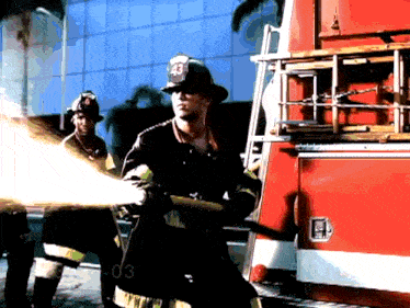 a firefighter with the number 43 on his helmet