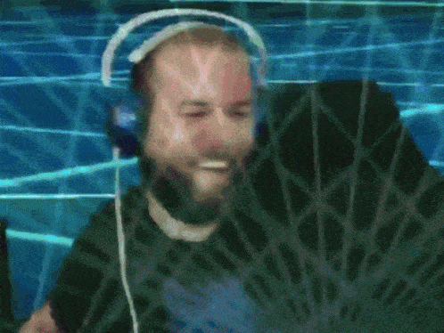 a man wearing headphones with a giraffe on his face