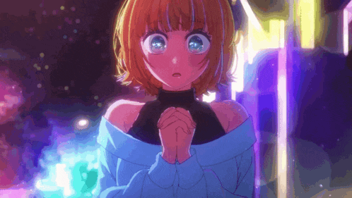 a girl with orange hair and blue eyes is praying with her hands folded in front of her face .