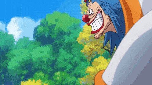 a clown with blue hair and a red nose is smiling