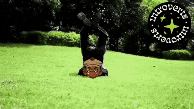 a cartoon character is doing a handstand in the grass with the words introverts in the background
