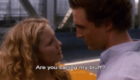 a man and a woman are looking into each other 's eyes and the woman is asking the man if he is calling her bluff