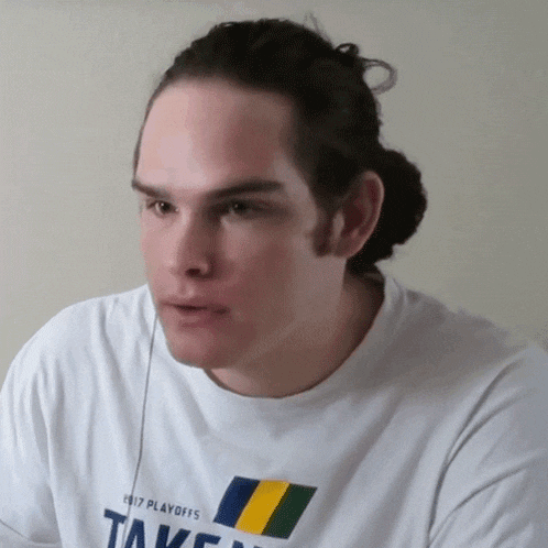 a man wearing a white shirt that says ' 2017 playoffs ' on it