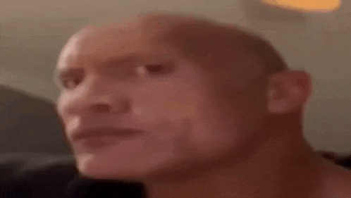a close up of a man 's face with his eyes closed .