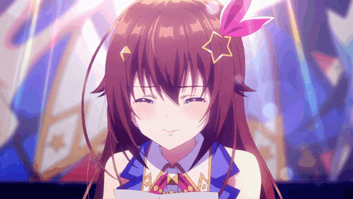 a close up of a girl with a star on her hair